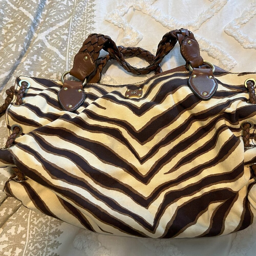 Michael Kors Brown Zebra Print Fabric Handbag with woven leather straps